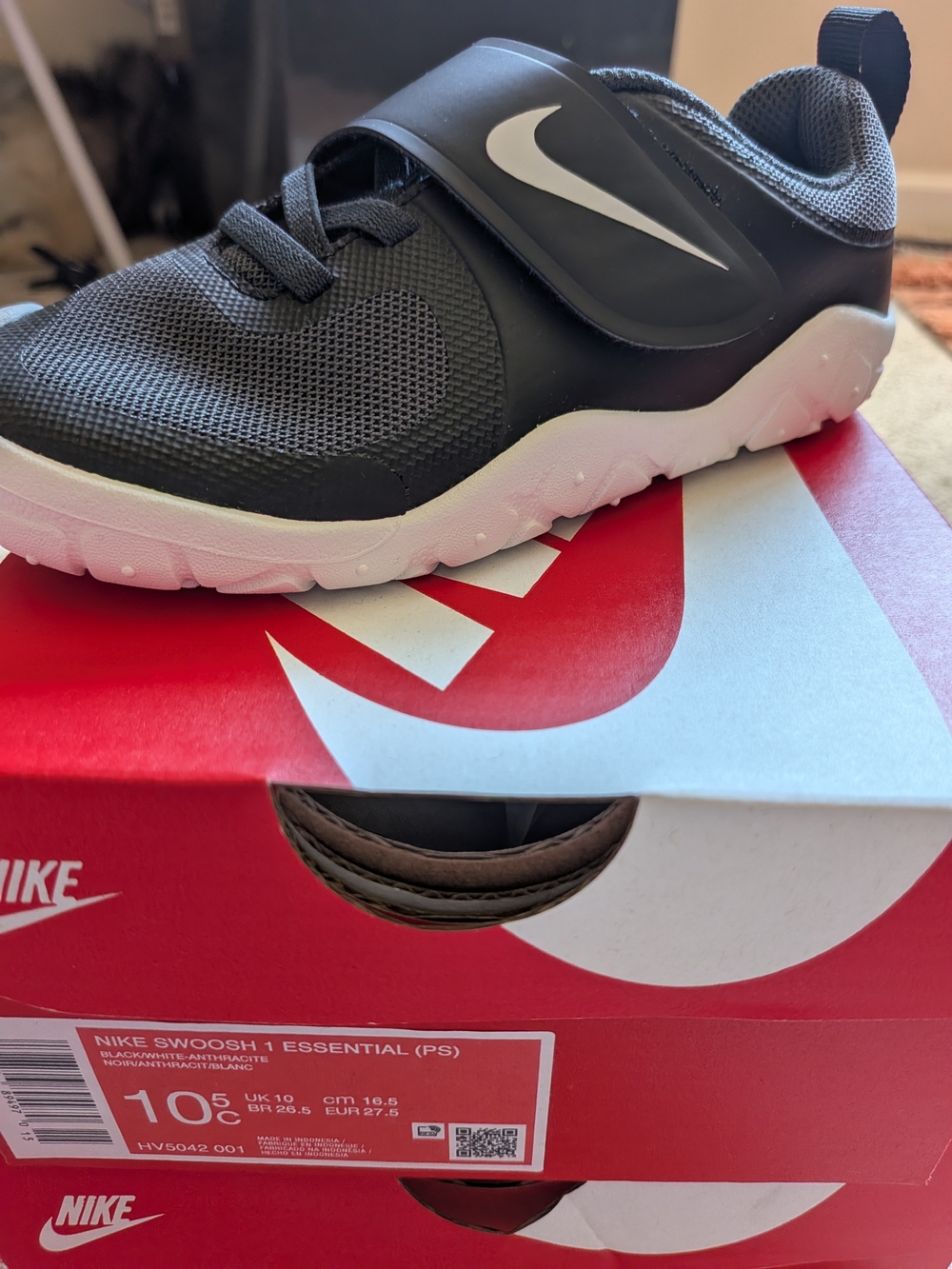 Nike Kids Black and White Swoosh Slip-On Sneaker